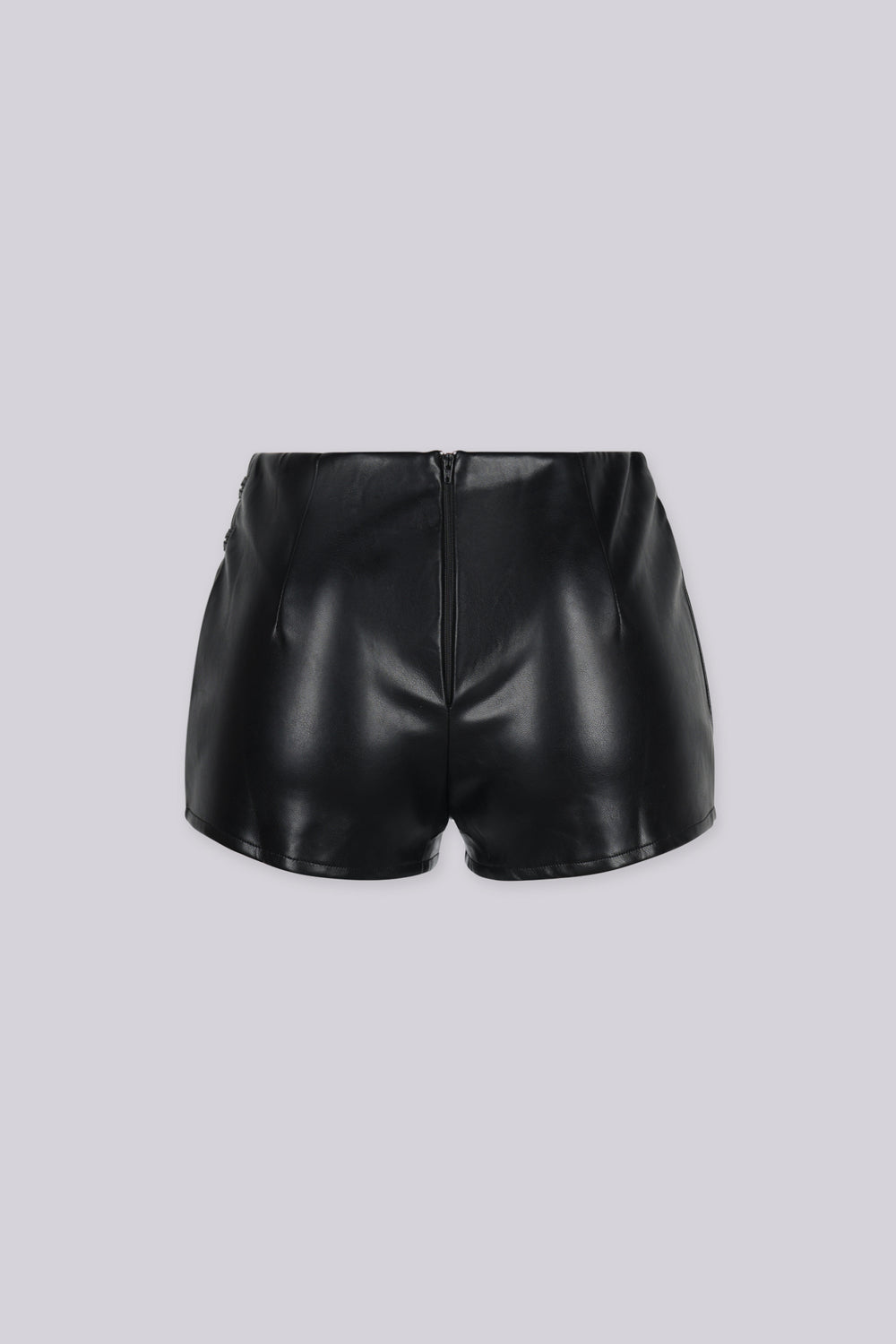 Military inspired high waisted faux leather shorts featuring double decorative buttons with braided cords on the side