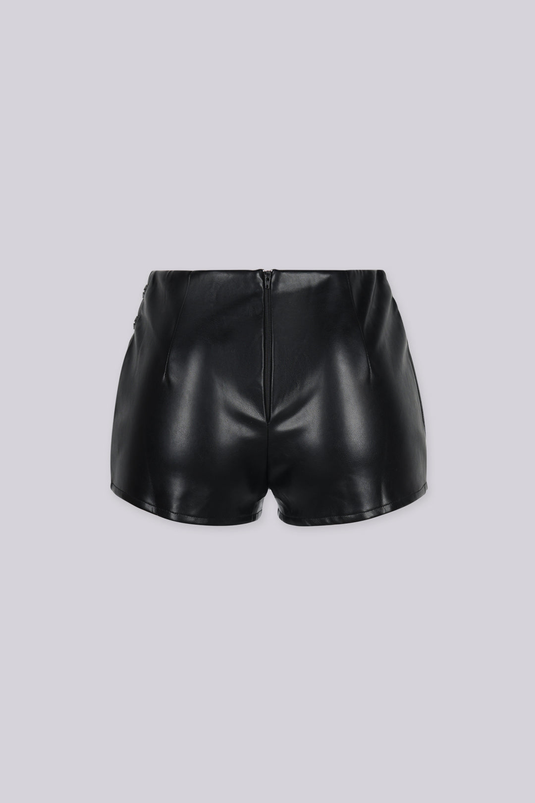 Military inspired high waisted faux leather shorts featuring double decorative buttons with braided cords on the side