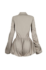 Pointed collared long sleeve romper with drawstring cinch waist with self tie bow featuring bubble hem skirt
Ruching along the outer shoulder seams  