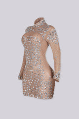 Sheer mesh long sleeve mini dress with scattered crystal and rhinestone embellishment throughout