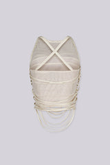 EDGE — cream mesh faux leather wrap top, back view on model