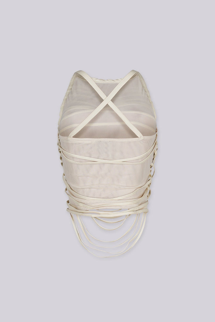 EDGE — cream mesh faux leather wrap top, back view on model