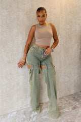 High rise wide leg washed denim pants featuring bold skin cutout detailing