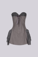 Strapless mini dress featuring a corset inspired bodice with a sweetheart neckline, Ruffle trim along the bust 