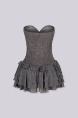 Strapless mini dress featuring a corset inspired bodice with a sweetheart neckline, Ruffle trim along the bust 