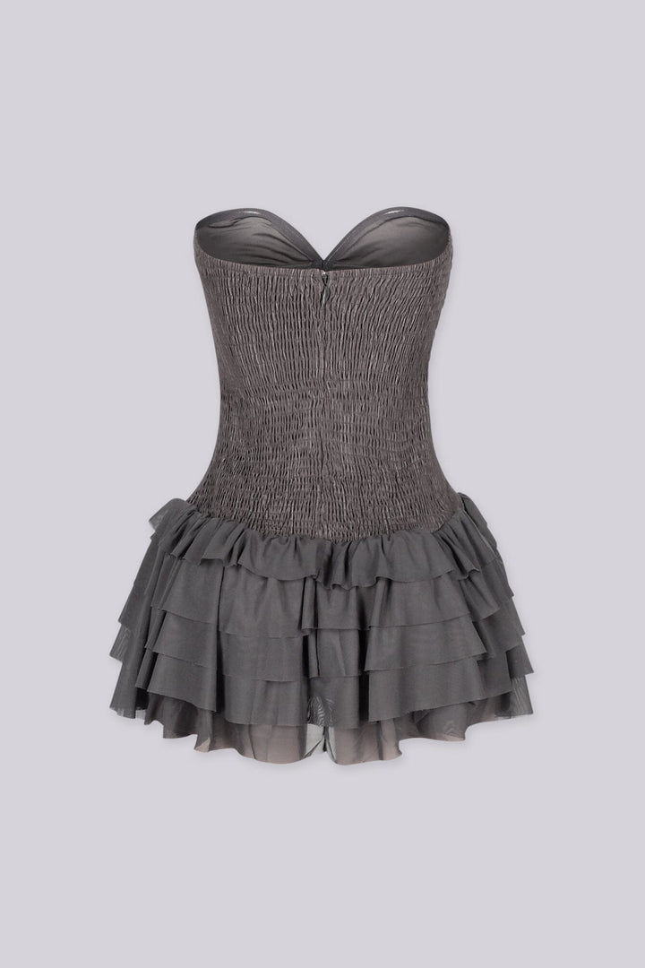 Strapless mini dress featuring a corset inspired bodice with a sweetheart neckline, Ruffle trim along the bust 