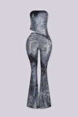 Strapless fitted crop tube top in a glossy crocodile embossed print with asymmetrical draped hem crossing at the front