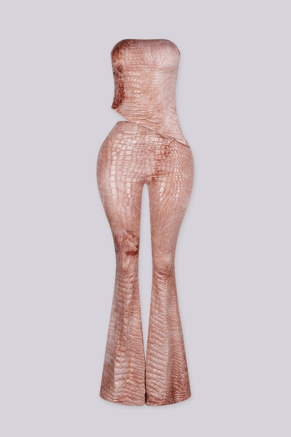 Strapless fitted crop tube top in a glossy crocodile embossed print with asymmetrical draped hem crossing at the front