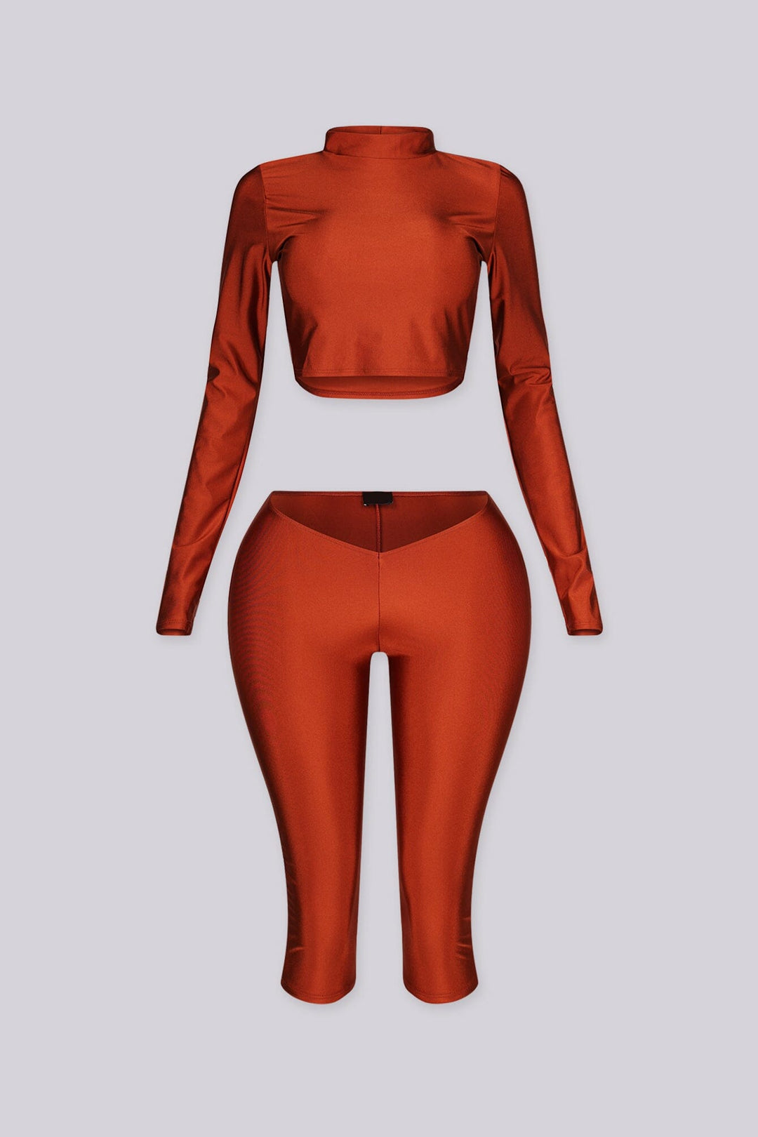 Long sleeve cropped top with mock neckline
Matching capri length leggings with V front waistband