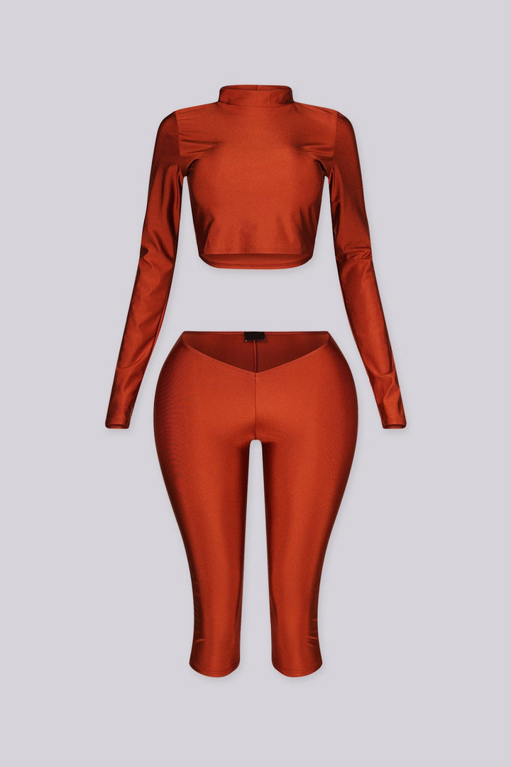 Long sleeve cropped top with mock neckline
Matching capri length leggings with V front waistband
