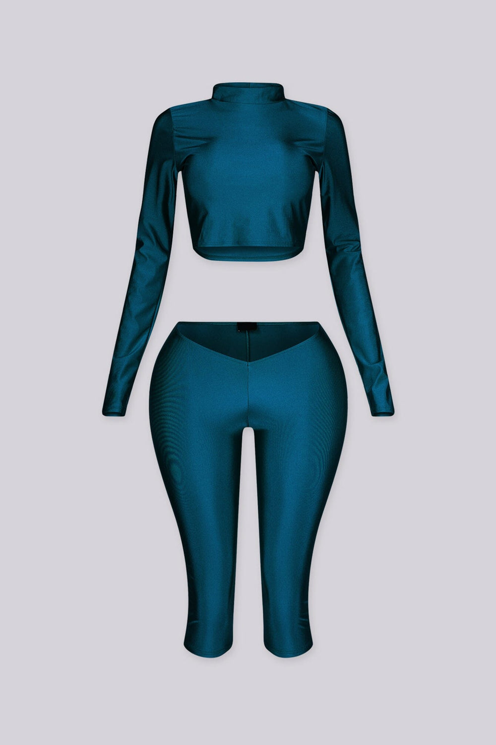 Long sleeve cropped top with mock neckline
Matching capri length leggings with V front waistband