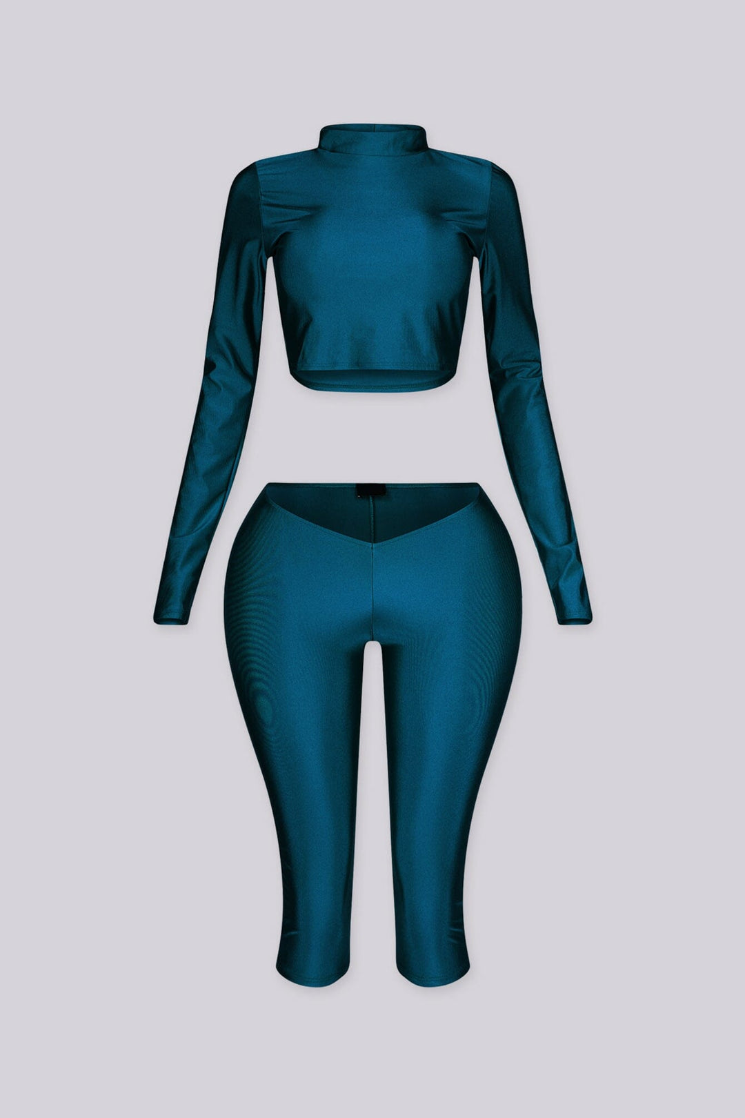 Long sleeve cropped top with mock neckline
Matching capri length leggings with V front waistband