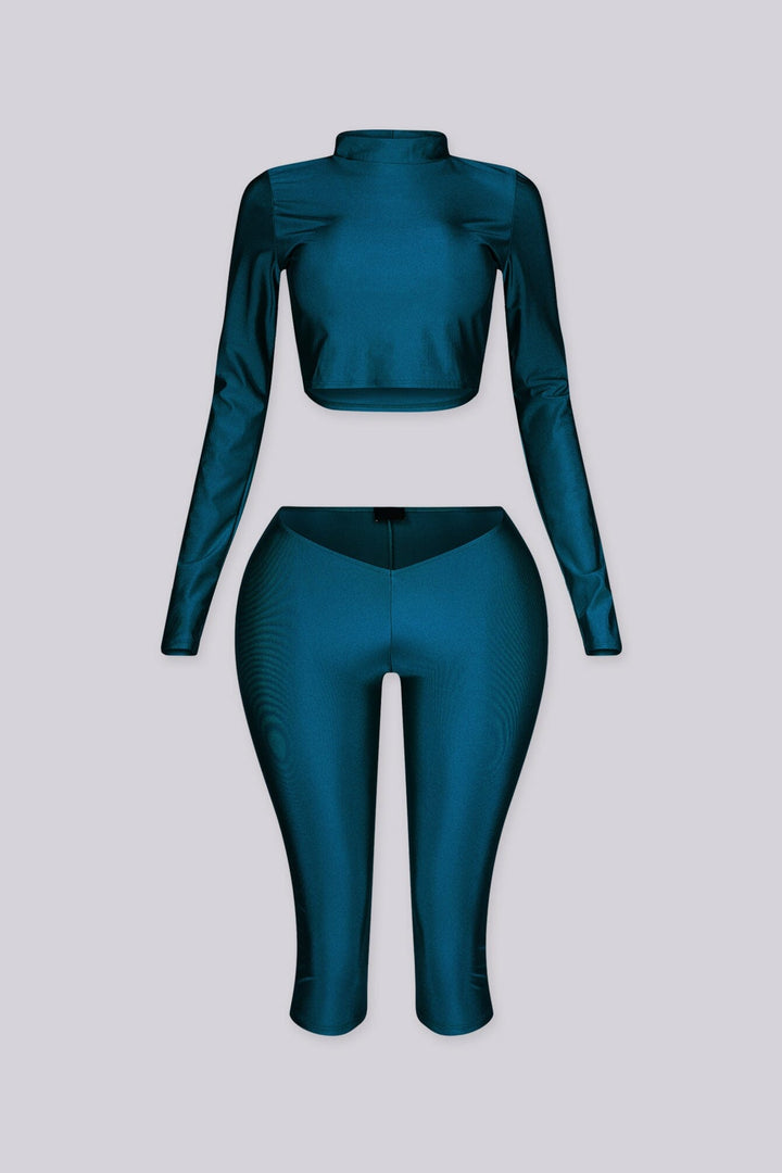 Long sleeve cropped top with mock neckline
Matching capri length leggings with V front waistband
