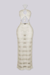 Open-knit crochet halter neckline dress with adjustable tie neck closure
Midriff cutouts connected by silver O-ring hardware
