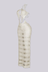 Open-knit crochet halter neckline dress with adjustable tie neck closure
Midriff cutouts connected by silver O-ring hardware