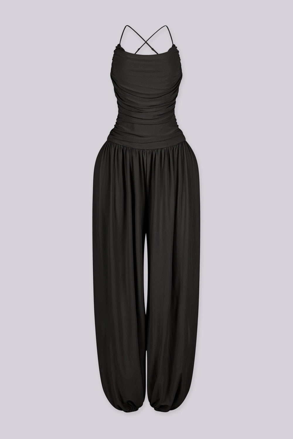 Tank top jumpsuit featuring draped cowl neckline with adjustable straps, Subtle horizontal ruched gathering across, Heavy gathering pants that taper at the bottom with elasticized ankle cuffs