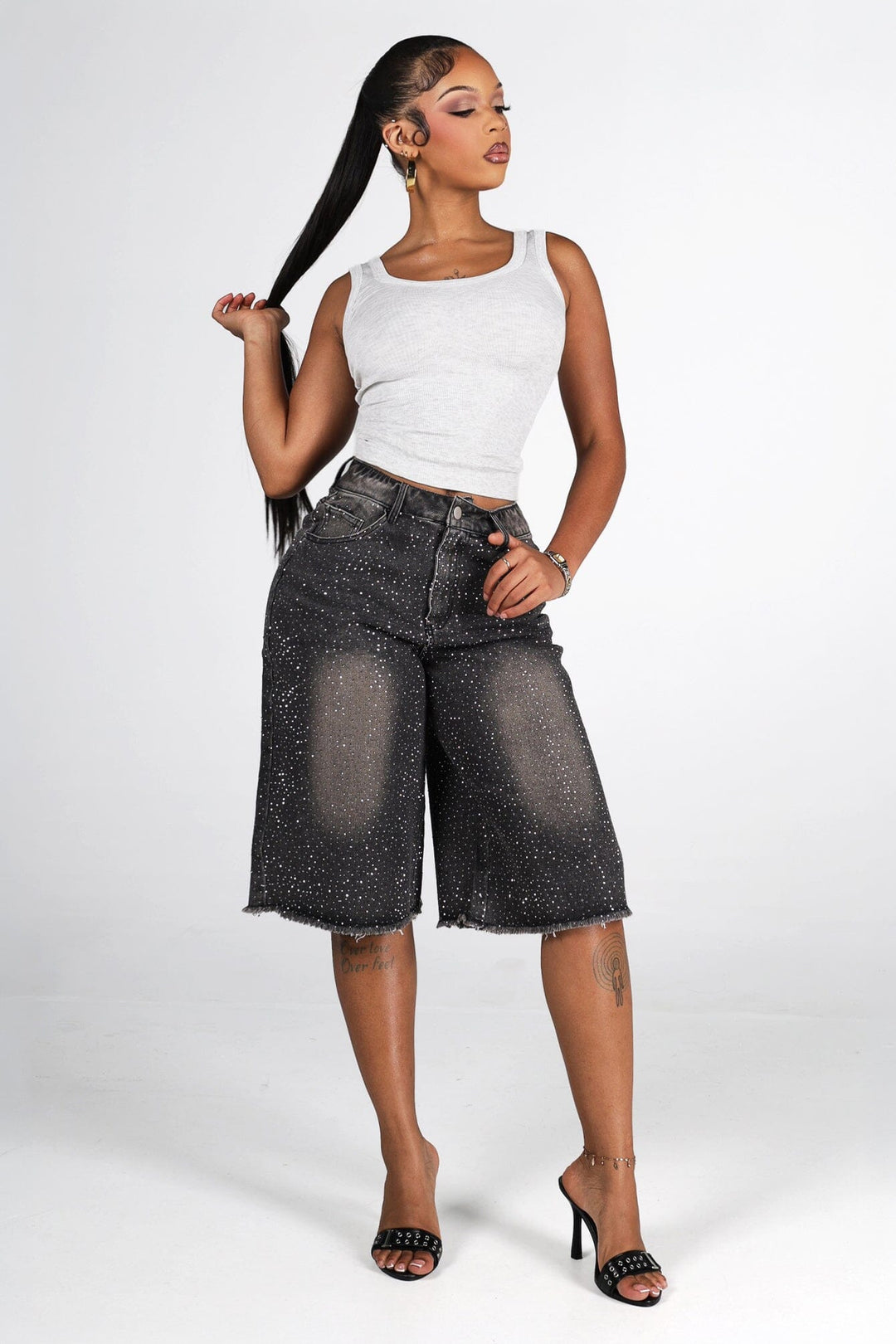Denim bermuda shorts with scattered rhinestone embellishments
