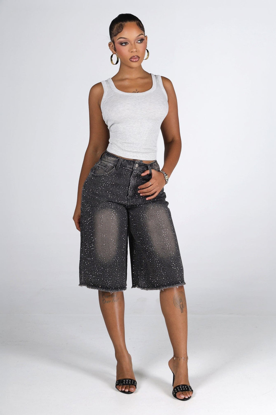 Denim bermuda shorts with scattered rhinestone embellishments