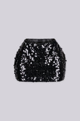Low rise mini skirt fully covered in oversized metallic sequins and shimmering disc paillettes