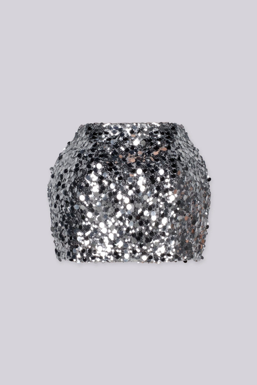 Low rise mini skirt fully covered in oversized metallic sequins and shimmering disc paillettes