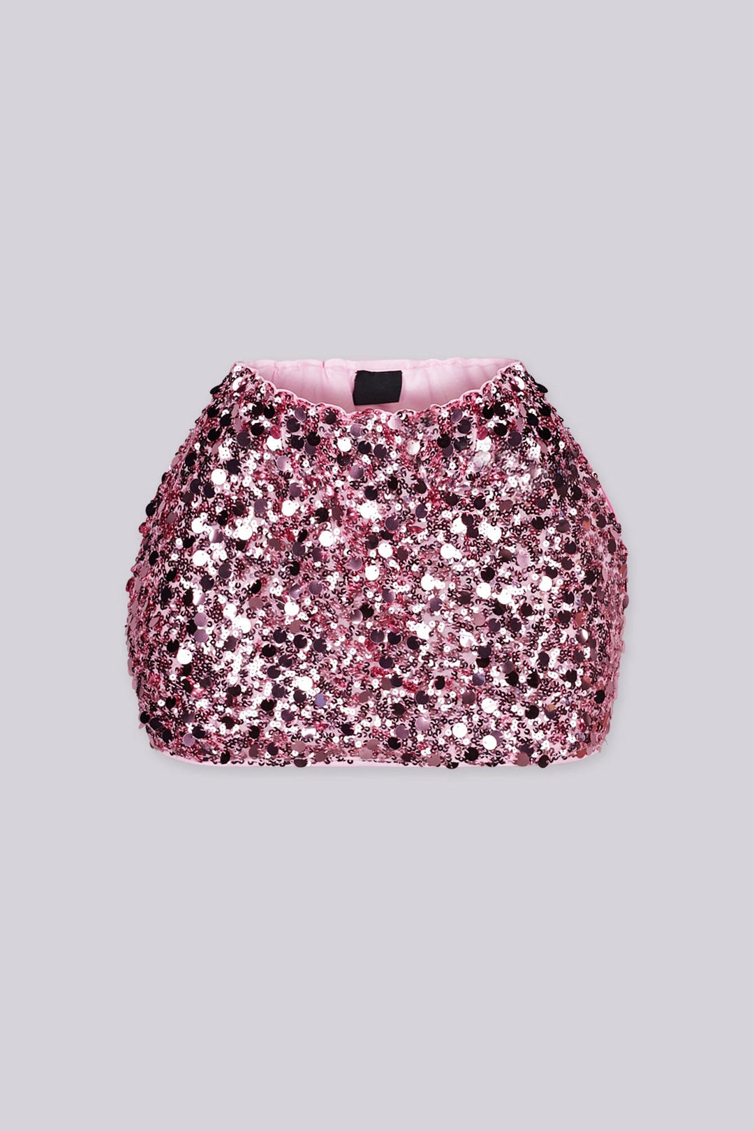 Low rise mini skirt fully covered in oversized metallic sequins and shimmering disc paillettes