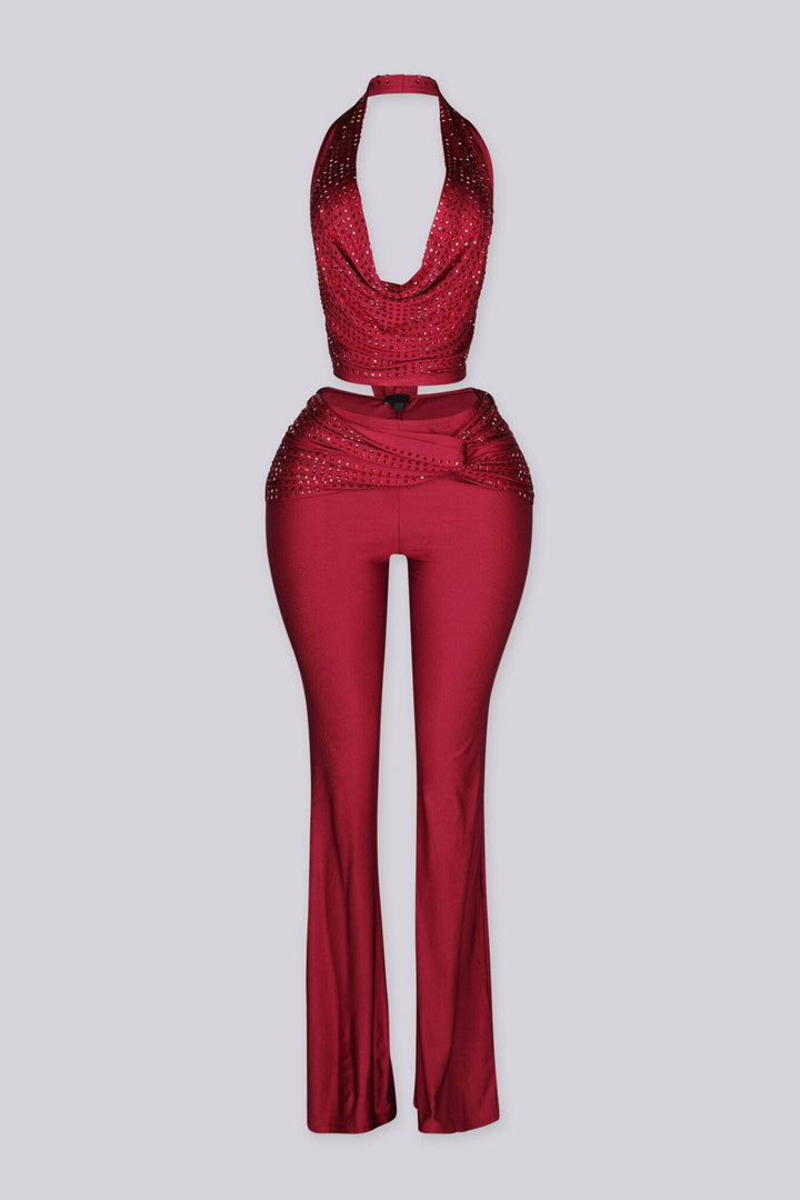 Cropped halter top with deep plunging cowl draped neckline featuring rhinestone embellishments throughout
