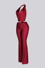 Cropped halter top with deep plunging cowl draped neckline featuring rhinestone embellishments throughout