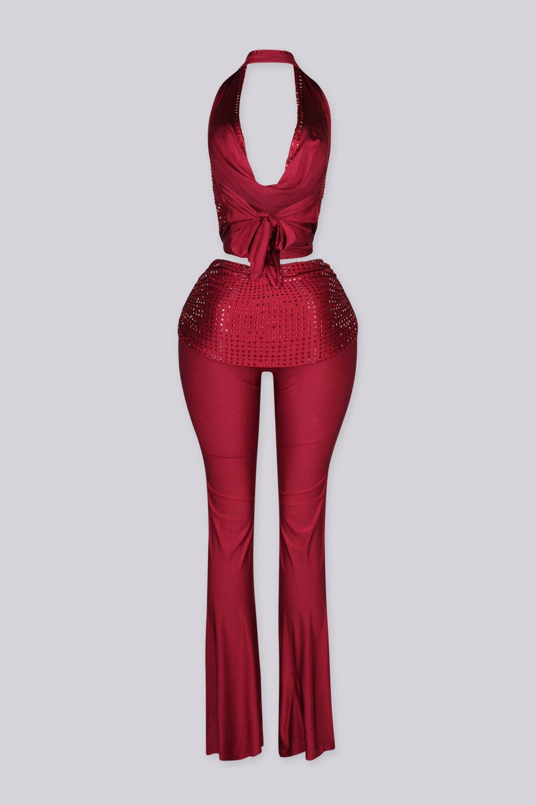 Cropped halter top with deep plunging cowl draped neckline featuring rhinestone embellishments throughout