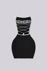 Strapless bodycon knit mini dress with crisscross lace up cutout detailing at back, back view