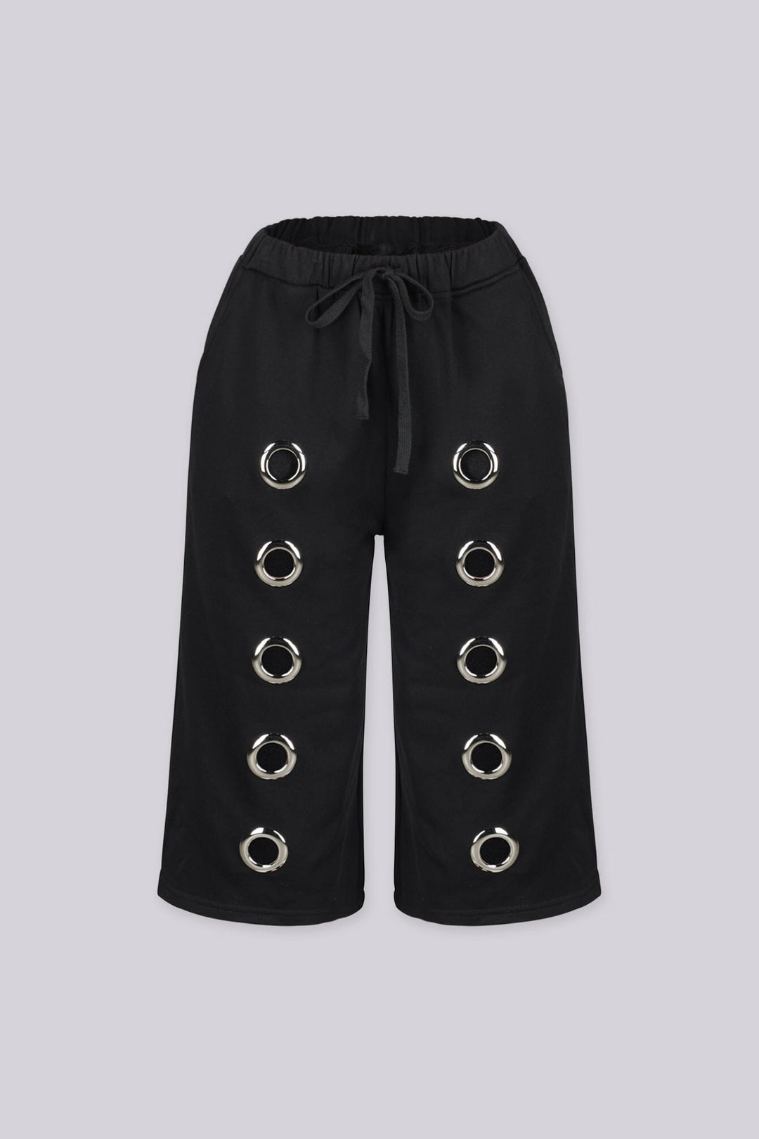 Relaxed fit longline Bermuda style sweat shorts
Functional side pockets and standout oversized silver metal grommets