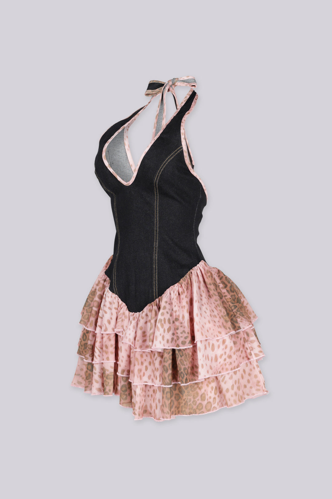 Fitted denim bodice halter mini dress with plunging deep V neckline