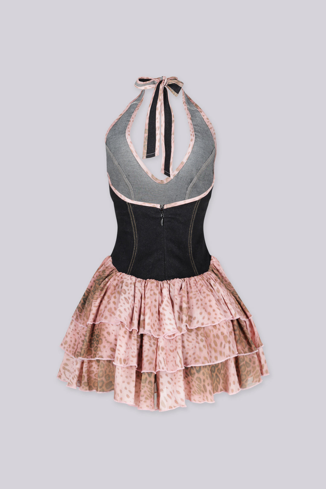 Fitted denim bodice halter mini dress with plunging deep V neckline