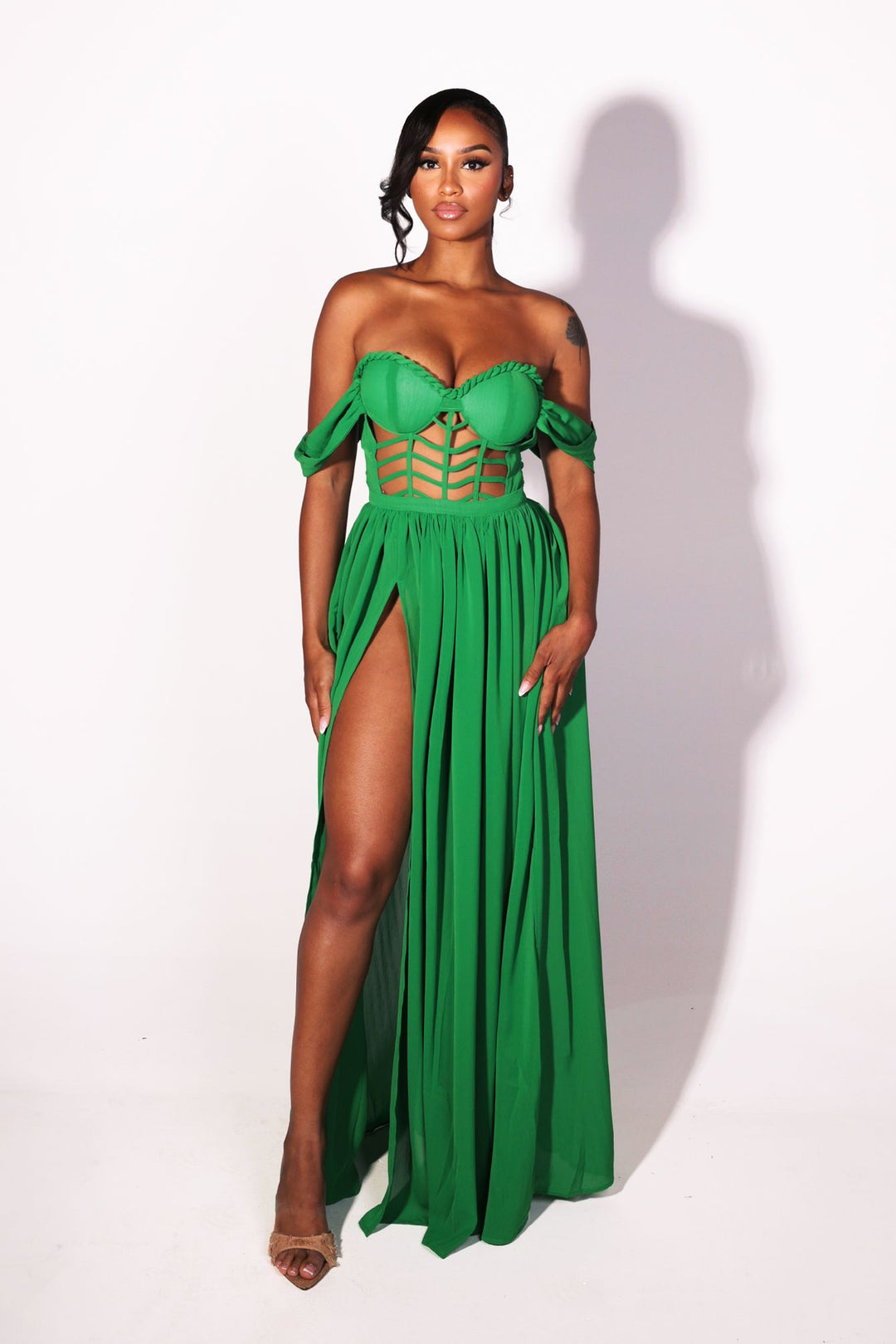 Corset bodice maxi dress with padded bustier and sweetheart neckline featuring cage cutouts and wide shoulder straps