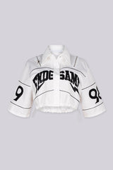 Collared crop jacket with "END GAME" graphic lettering on chest and "1998" numbering on the sleeves, white front view
