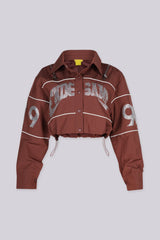 Long sleeve collared crop jacket with "END GAME" rhinestone graphic lettering on chest and "1998" numbering on the sleeves