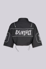 EDGEBYKS - Collared crop jacket with "END GAME" rhinestone graphic lettering on chest. back view.