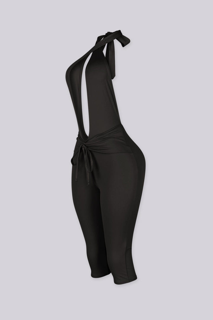 Deep plunge halter capri jumpsuit with draped front with adjustable tie neck closure