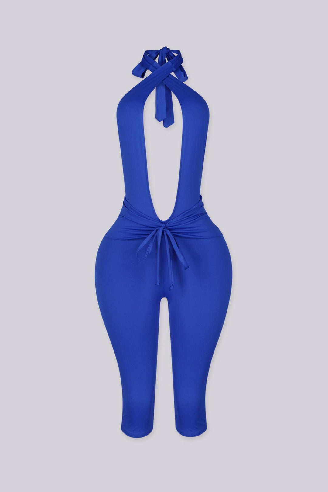 Deep plunge halter capri jumpsuit with draped front with adjustable tie neck closure