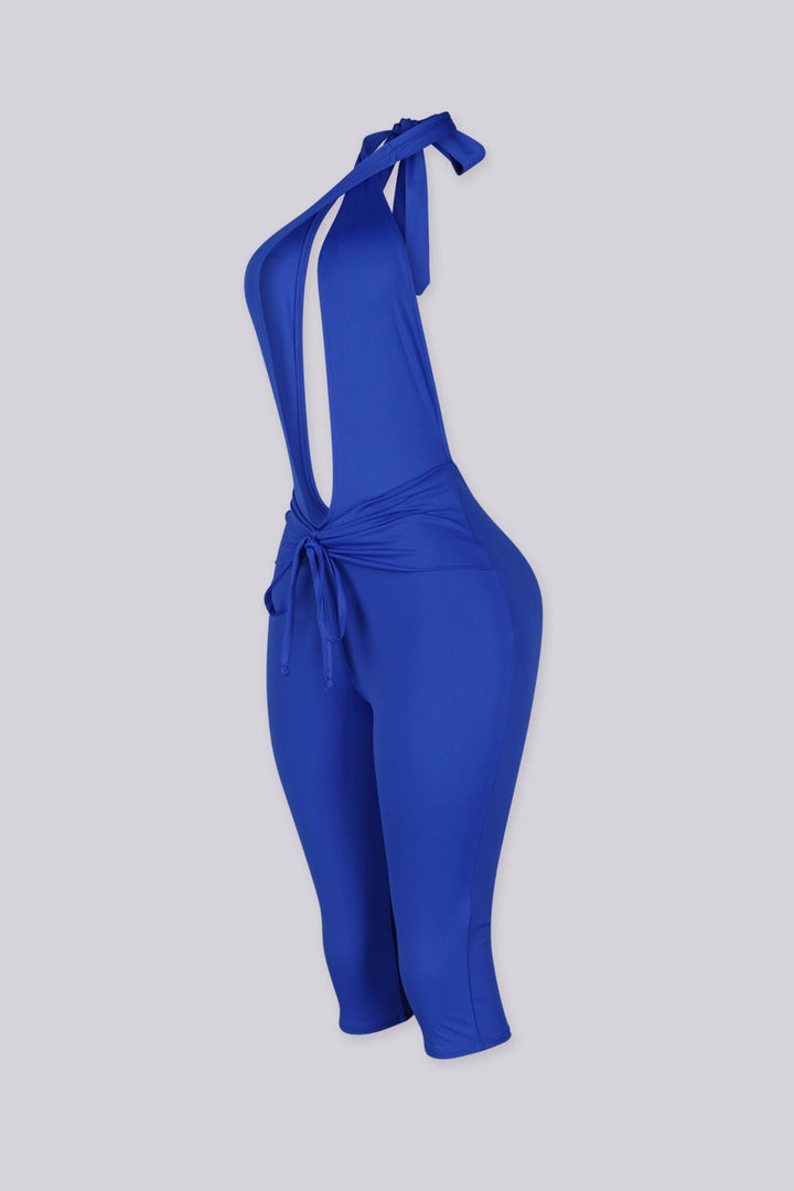 Deep plunge halter capri jumpsuit with draped front with adjustable tie neck closure