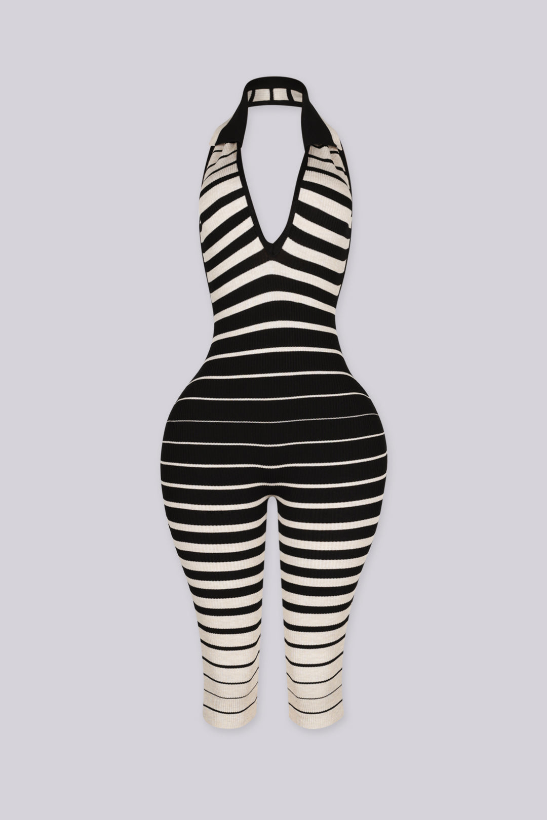 Ribbed knit sleeveless halter capri jumpsuit with deep plunging V neckline in ombre stripe print