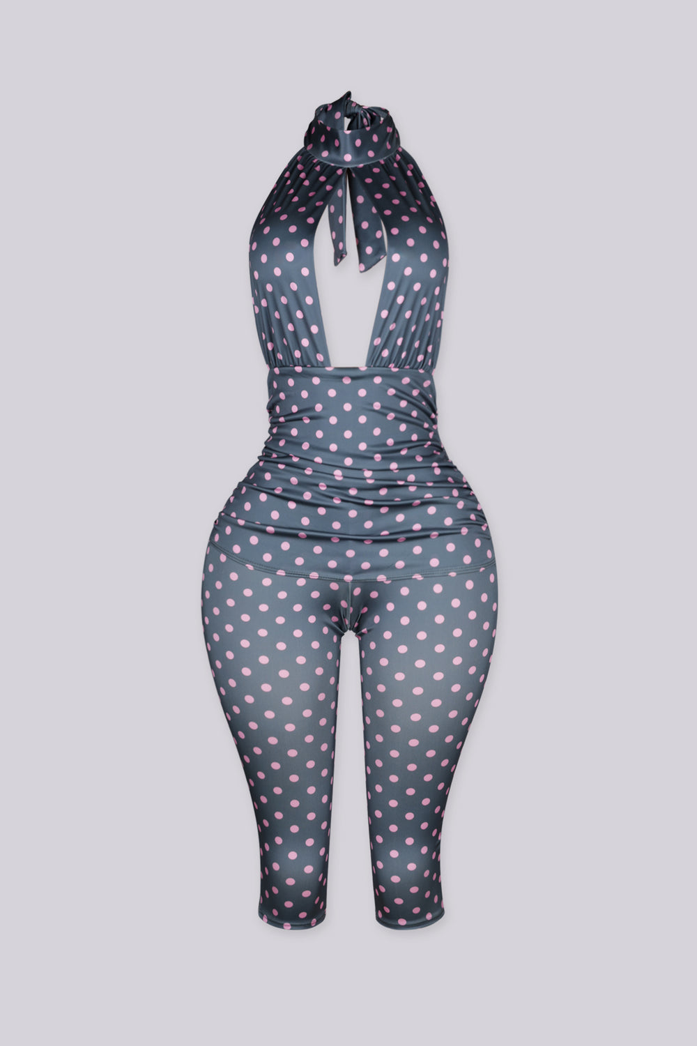 Sleeveless retro polka dot print jumpsuit with high mock collar featuring keyhole cutout opens below the collar