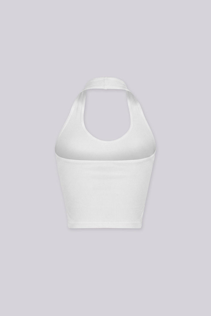 Ribbed halter neck crop top featuring a bold plunging scoop neckline