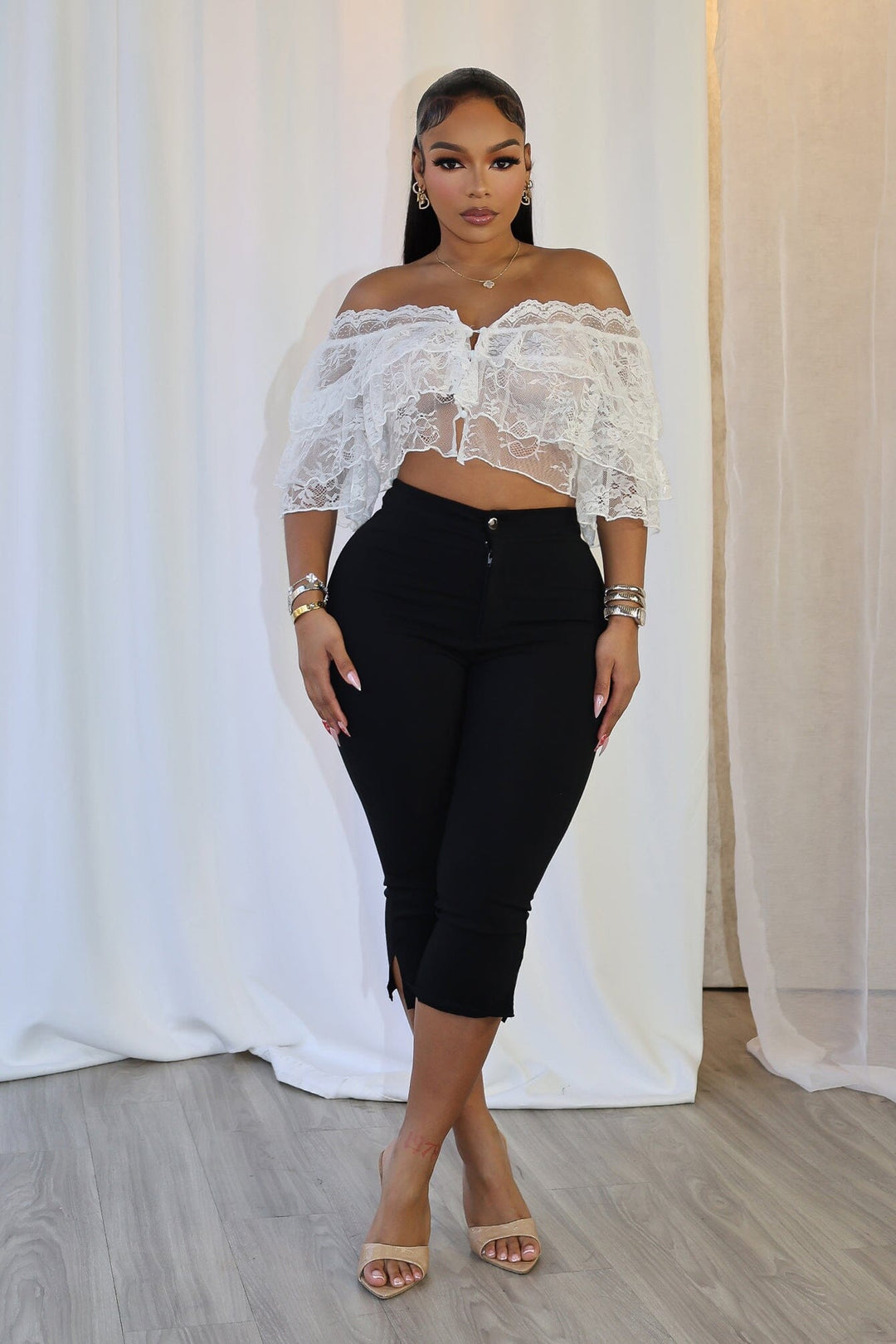 Mesh floral lace crop top with off shoulder neckline featuring layered ruffle details
