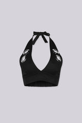 Deep V neckline halter bra top with large metal grommet details