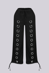 High waisted wide leg pants with side grommet detailing
Elastic waistband with adjustable drawstring