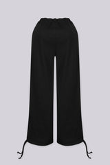 High waisted wide leg pants with side grommet detailing
Elastic waistband with adjustable drawstring