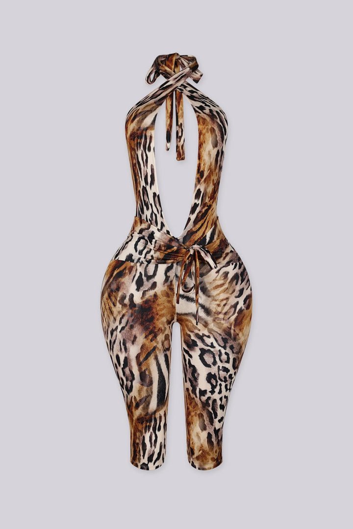 Leopard print halter jumpsuit with a deep plunge neckline and fluid drape
Open back design with adjustable tie neck closure