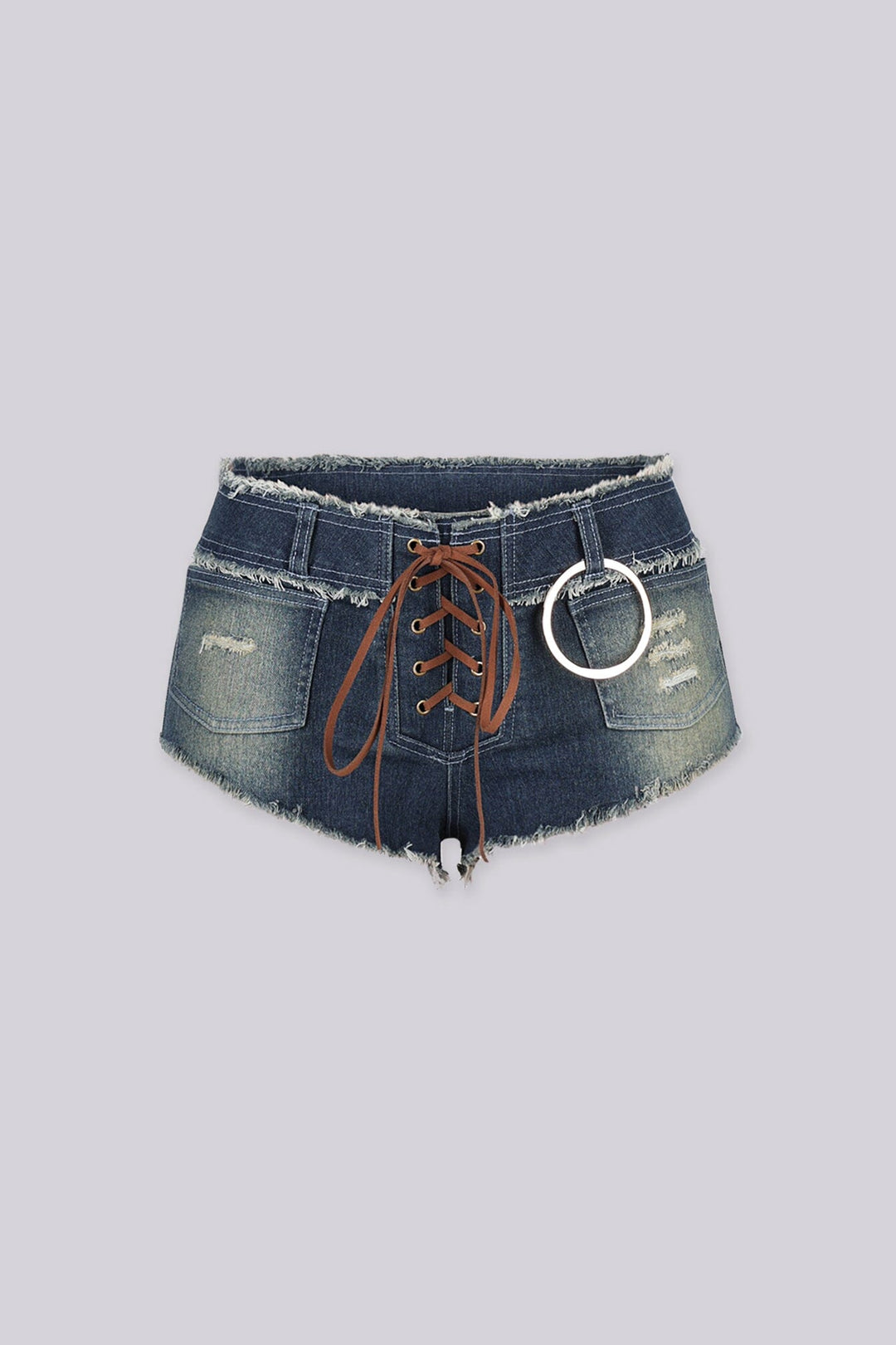 Ultra low rise distressed denim shorts featuring lace up details and sliver O ring hardware