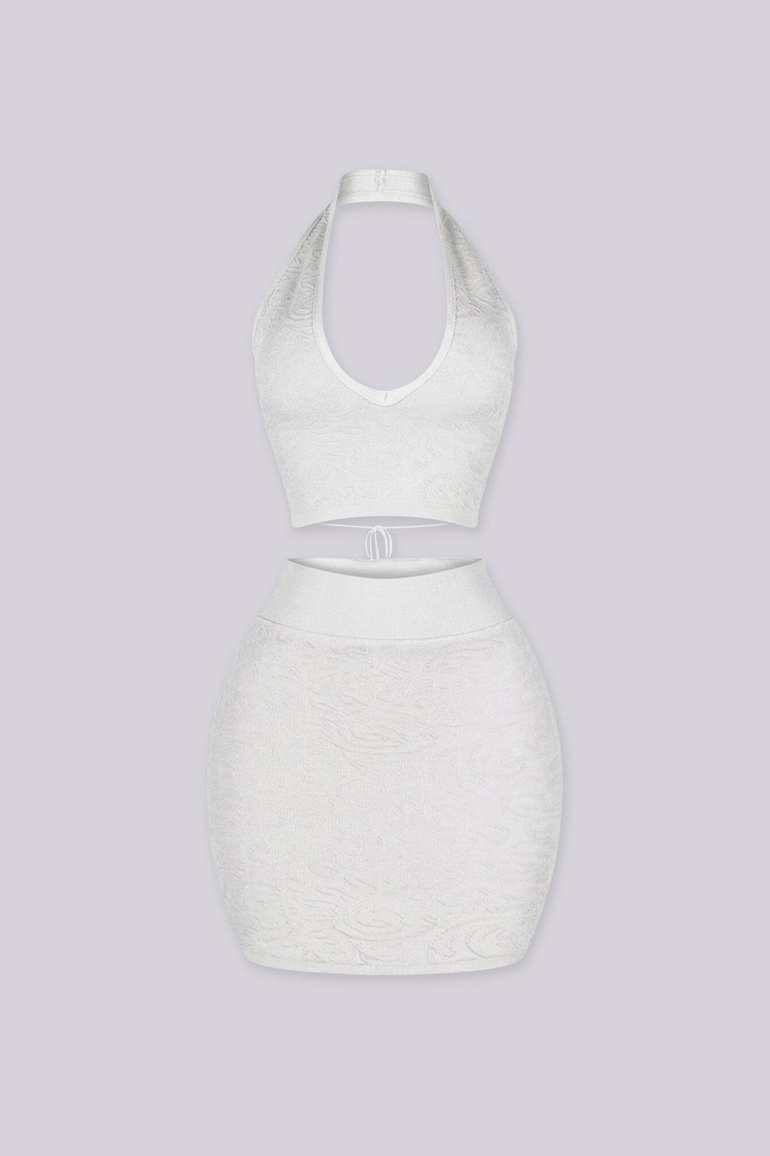 knit halter crop top with deep V plunge neckline featuring crisscross lace up eyelet closure
Matching high waisted bodycon mini skirt with wide elastic waistband