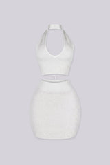knit halter crop top with deep V plunge neckline featuring crisscross lace up eyelet closure
Matching high waisted bodycon mini skirt with wide elastic waistband